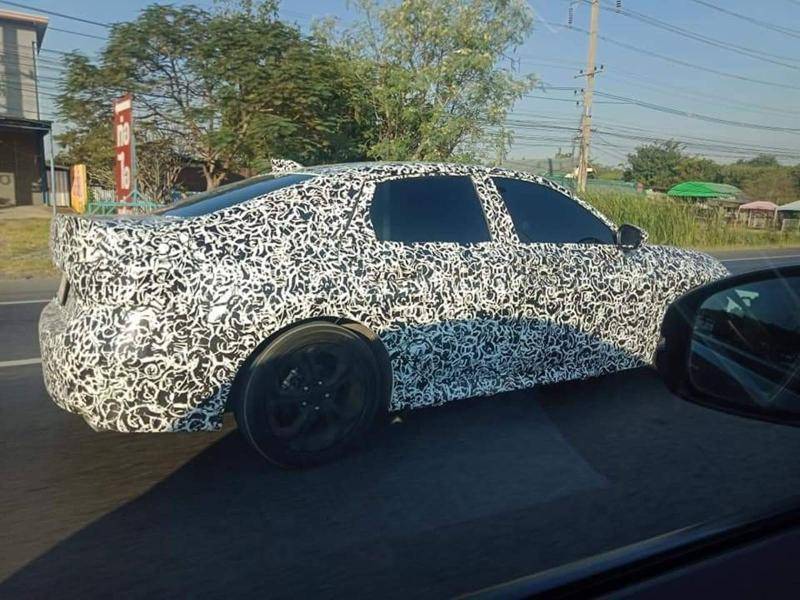 11th Gen Honda Civic Spied: 2022 Civic Sedan in Platinum White and Lunar Silver (US Spec) ab9b0c730e594340beb5b684e3904017_800