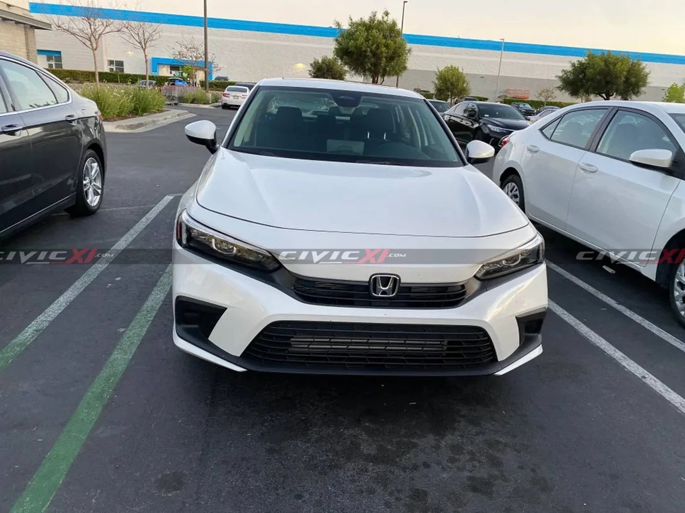 11th Gen Honda Civic 2022 Civic Sedan Spied in Costco Parking Lot 2022-civic-11th-gen-spied-torrance-costco-1