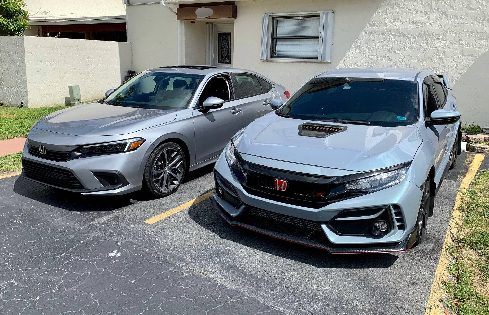 11th Gen Honda Civic 2022 Civic Touring sedan side-by-side with FK8 Type R LUNAR SILVER METALLIC 2022 Civic Sedan vs Civic Type R 2