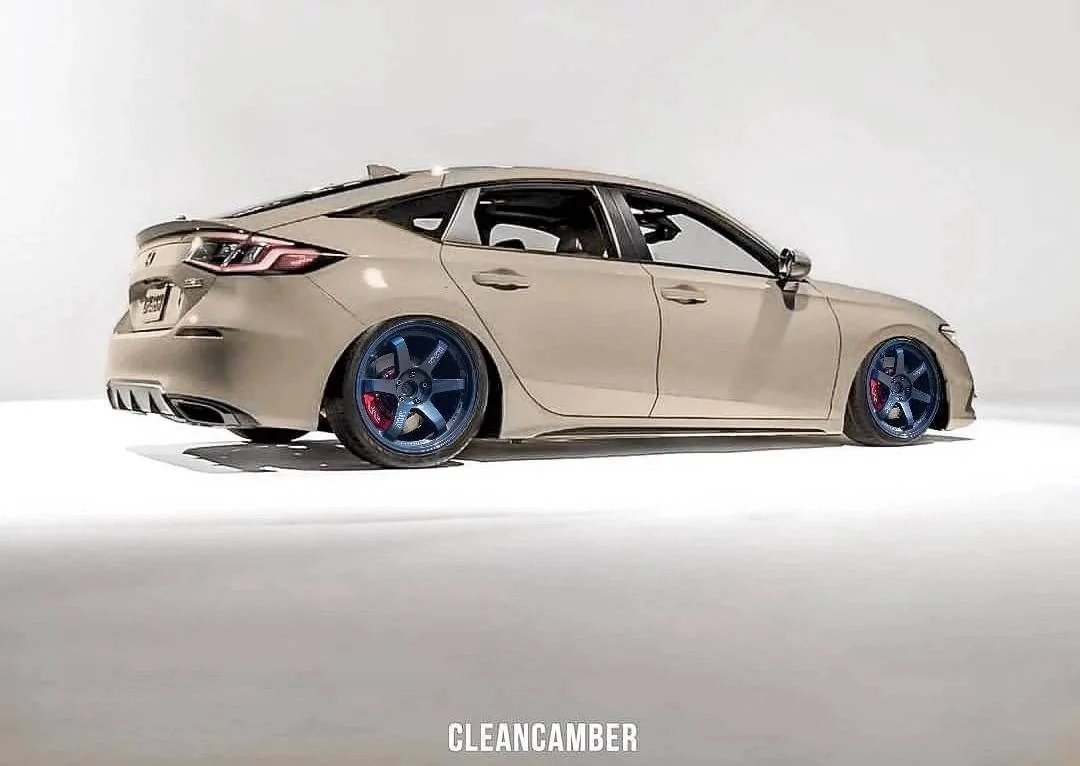 11th Gen Honda Civic Lowered / Slammed 2022 Civic Hatchback previewed on aftermarket suspension and wheels slammed lowered 2022 Civic hatchback aftermarket wheels TE37 mag blu