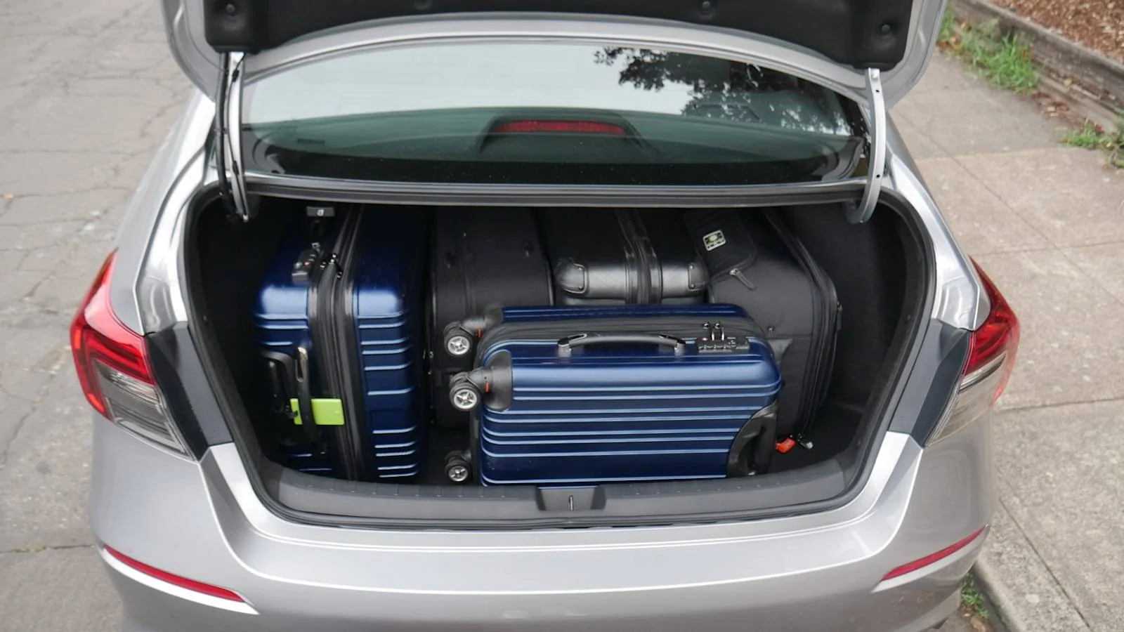 11th Gen Honda Civic 2022 Civic Luggage Capacity Test Shows Midsize Sedan Capability 2022-Honda-Civic-Sport-trunk-with-bags