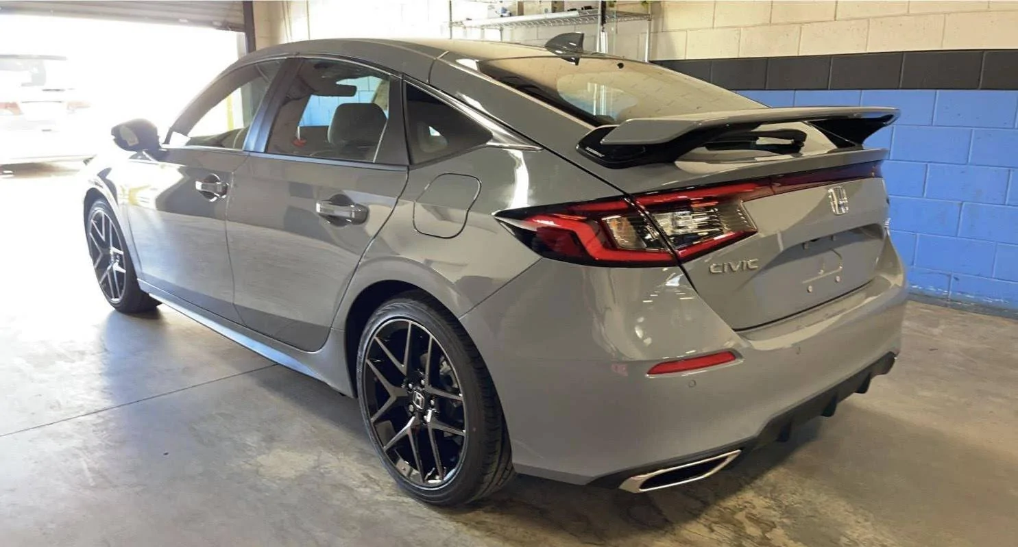 11th Gen Honda Civic Pre Pickup pics from my dealer, 22' Sport Touring hatchback, manual sonic gray with wing 1