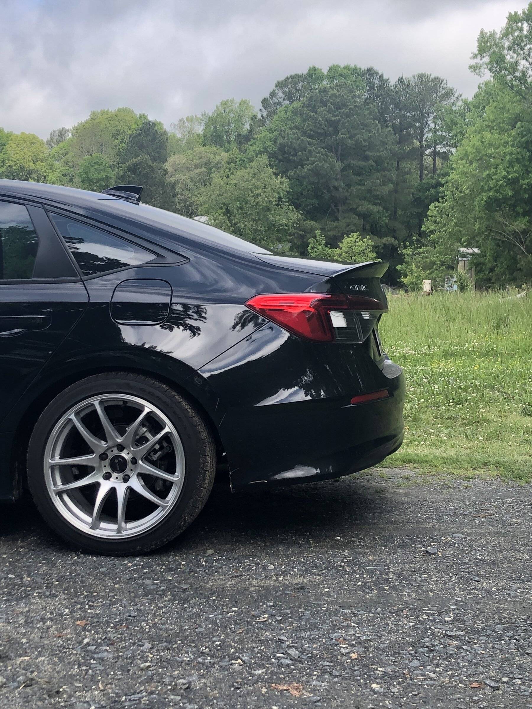 11th Gen Honda Civic Black, Lowered on H&R, HPD front and rear spoilers. E12B7E51-C125-4BB0-BA86-DABCA60121A5