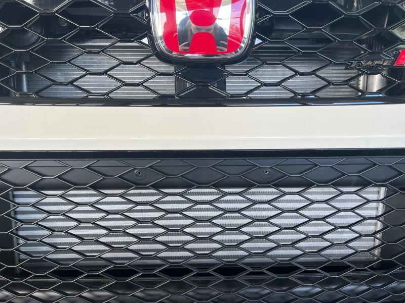 11th Gen Honda Civic Front plate removal aftermath 2500159d-d685-4a10-8401-2a05b893599b