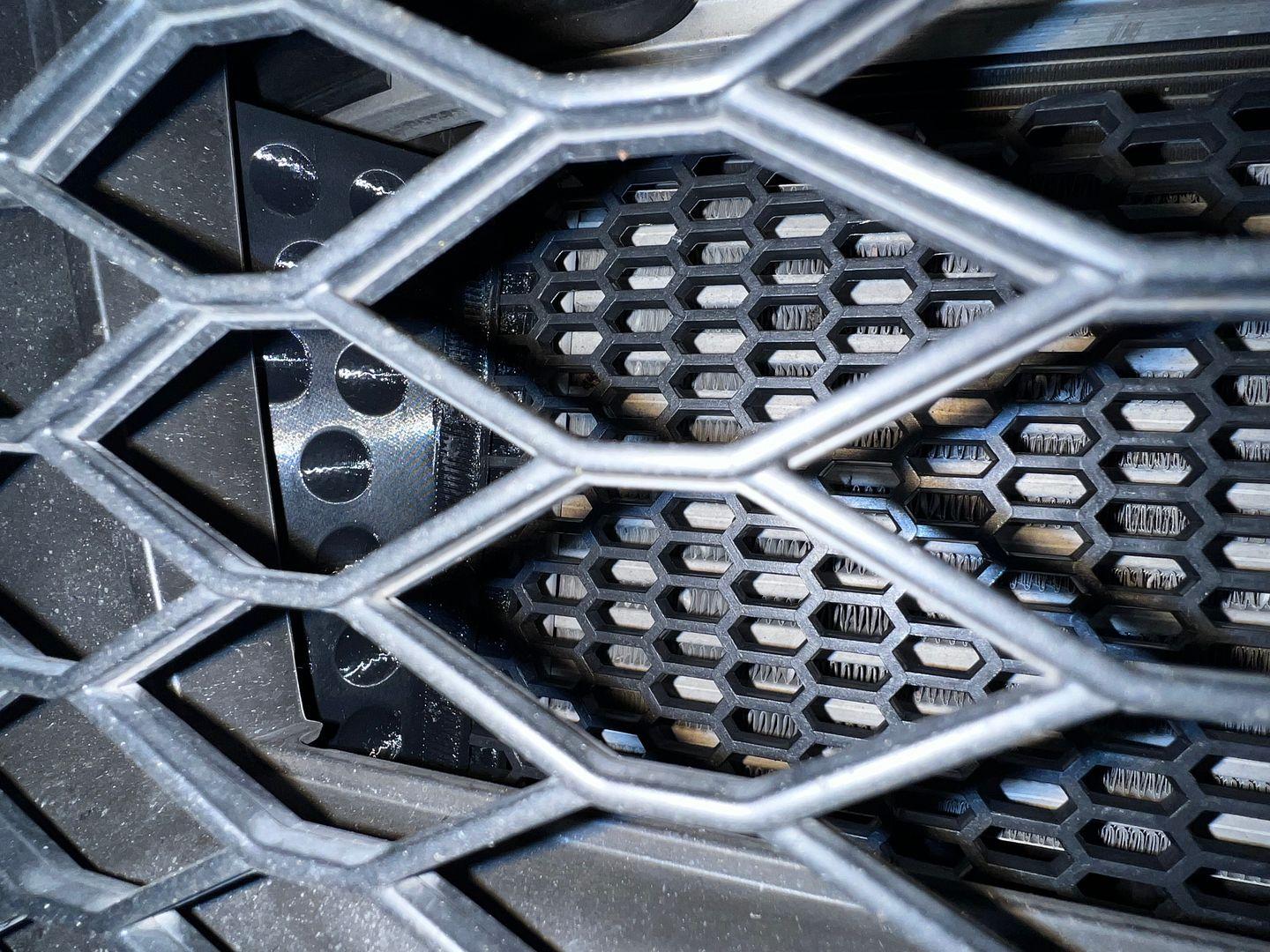 11th Gen Honda Civic Are any of you guys running an intercooler and radiator shield to keep rocks and bugs from ... IMG_6318