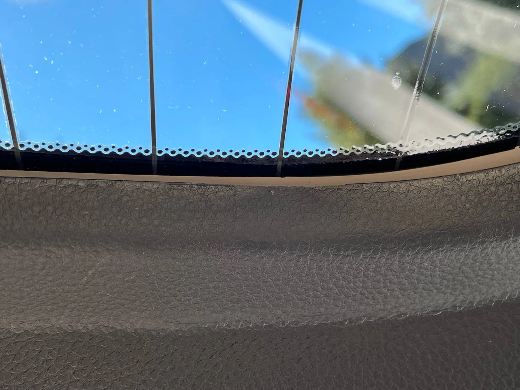 11th Gen Honda Civic Did my tint installer melt the hatch trim or do they all look like this? IMG_3104