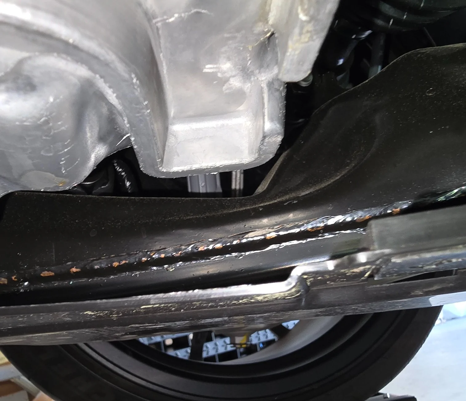 11th Gen Honda Civic Rust on frame welds and scuffs on metal 20250830_143839~3