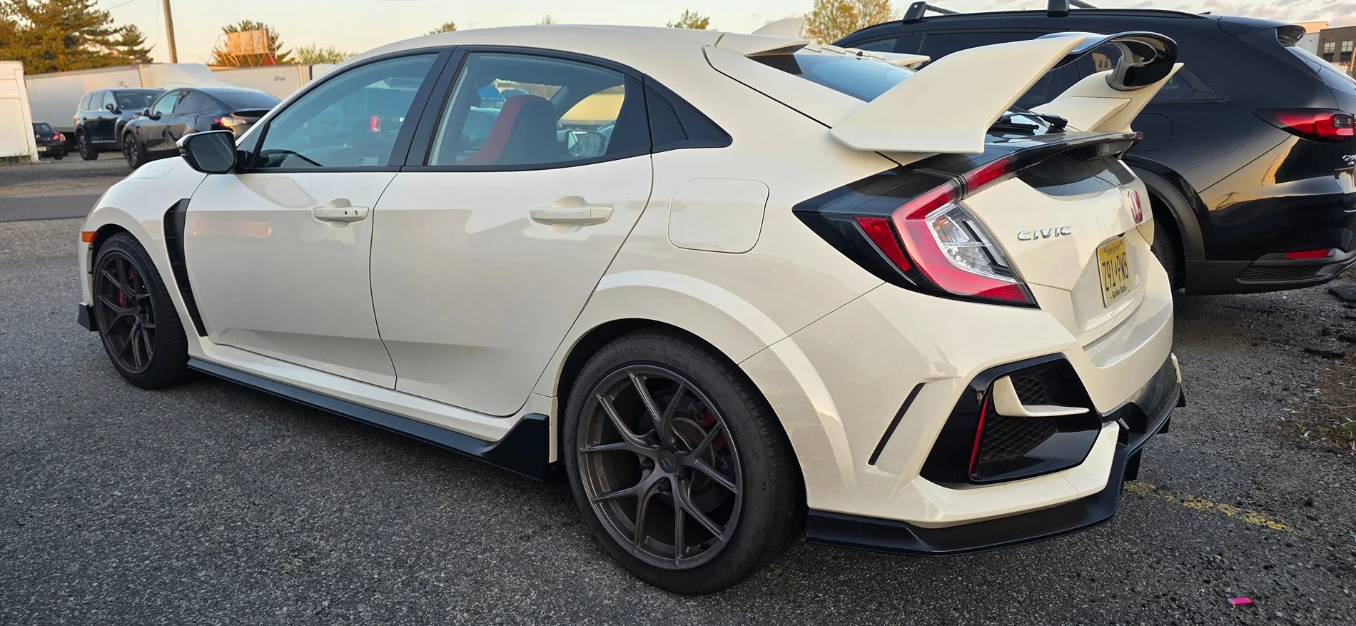 11th Gen Honda Civic FS: Titan 7  (5) 18x9.5 +45 Satin Titanium, perfect for Civic Type R (New Jersey) $1950/obo, 5 wheels and tires and lugs 20250427_193442