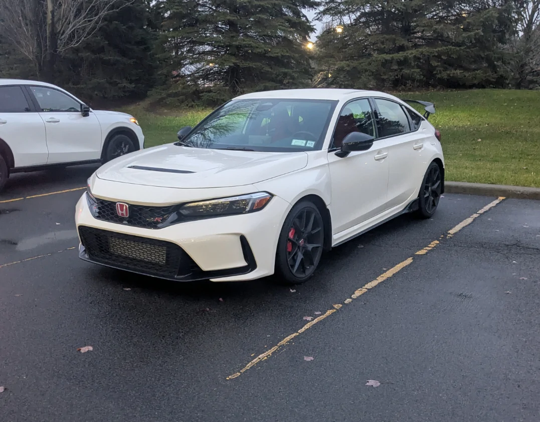 11th Gen Honda Civic Looking at rear splash guard 6935