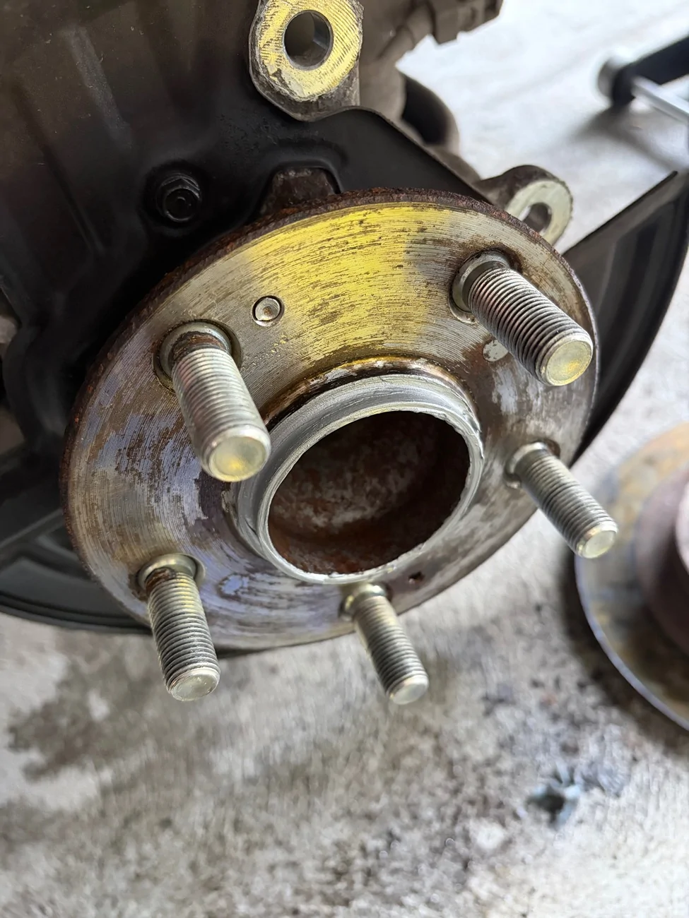 11th Gen Honda Civic How much of the front rotor screw do I need to drill out? IMG_7859