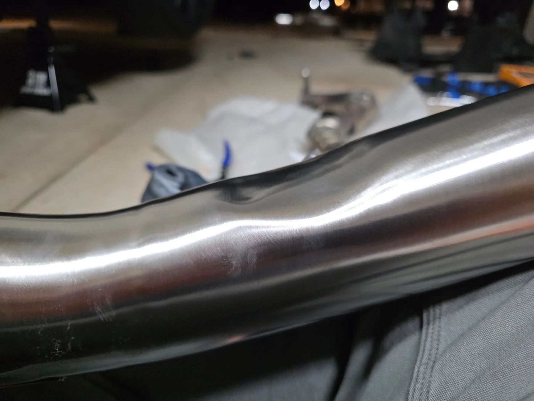 11th Gen Honda Civic Front pipe dented from manufacturer - run it or bolt stock exhaust back up? 20260522_211718