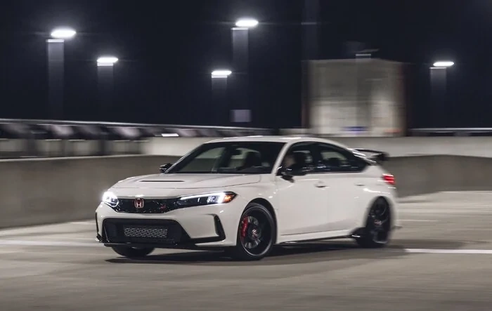 Car and Driver Review: Slipping and Sliding in the 2023 Honda Civic Type R around a Wet Sonoma Raceway